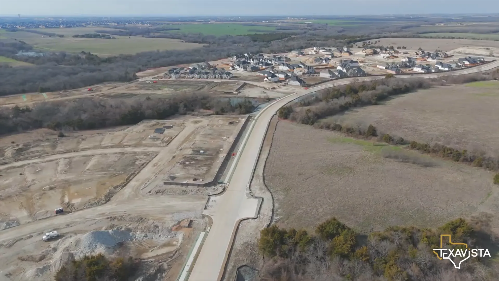 Lake and boardwalk at Aster Park gated community in McKinney Texas