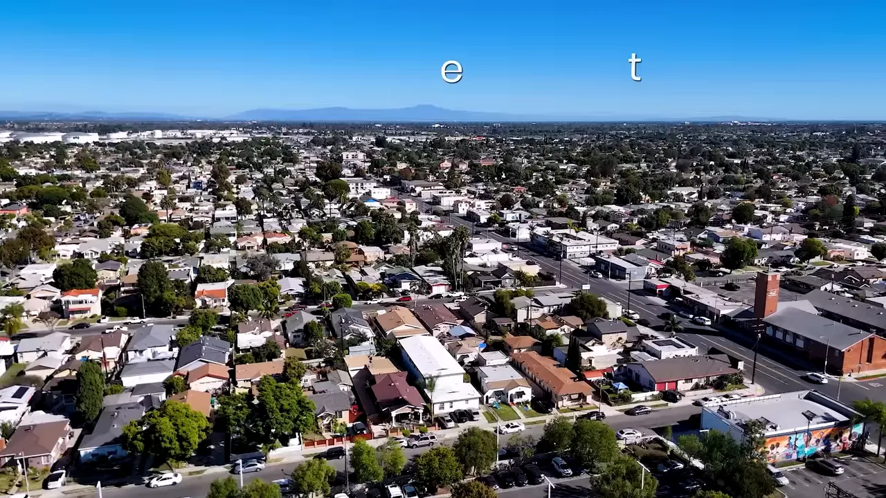 aerial neighborhood view with text saying the real question isnt whats happening now in la market