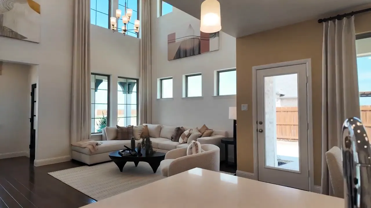 aerial view of 30-foot model home showing narrow lot and driveway