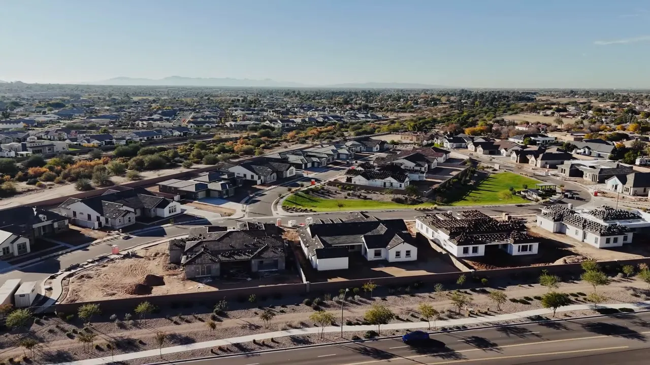 Presenter pointing to the screen with an 'Inventory:' caption and the subtitle 'Is anything we can close on, in the next 30-45 days' visible.