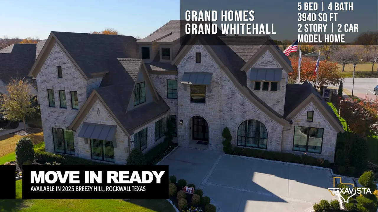 Close-up exterior view of the Grand Whitehall model home front facade and entry