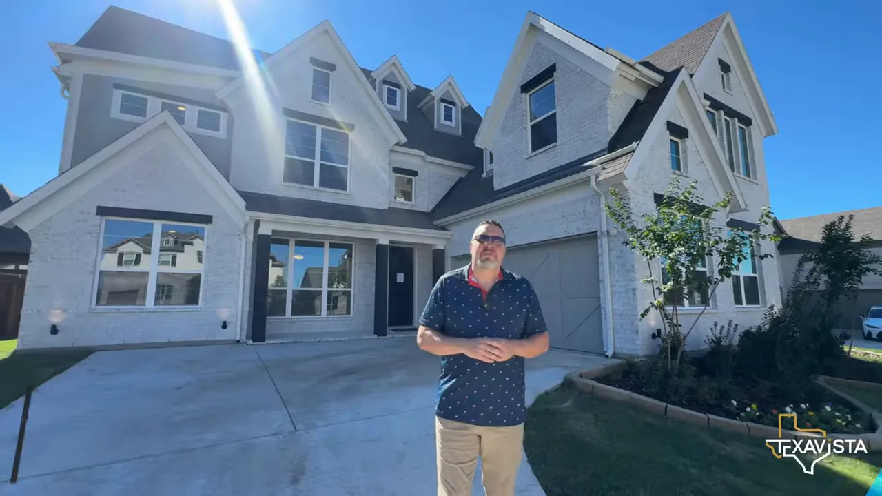Lake Forest model front exterior with covered porch and garage in Breezy Hill Rockwall TX