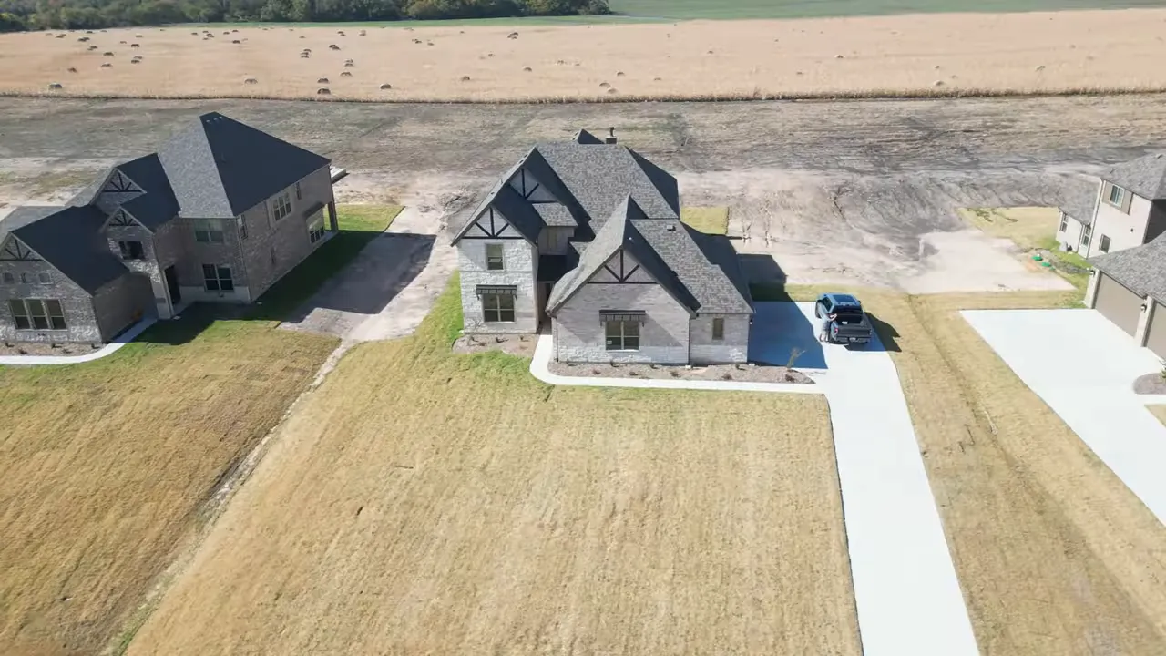 Aerial view of homes and long backyards with big backyard text