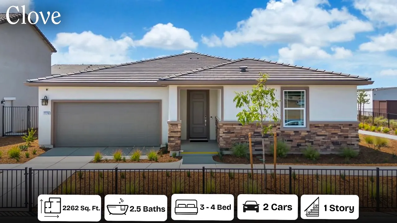 Large kitchen island and open-plan living in the Clove model
