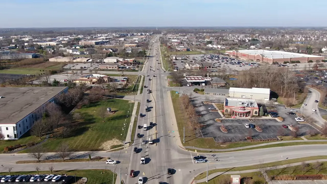 Aerial drone photo of Carmel High School campus with surrounding trees and parking