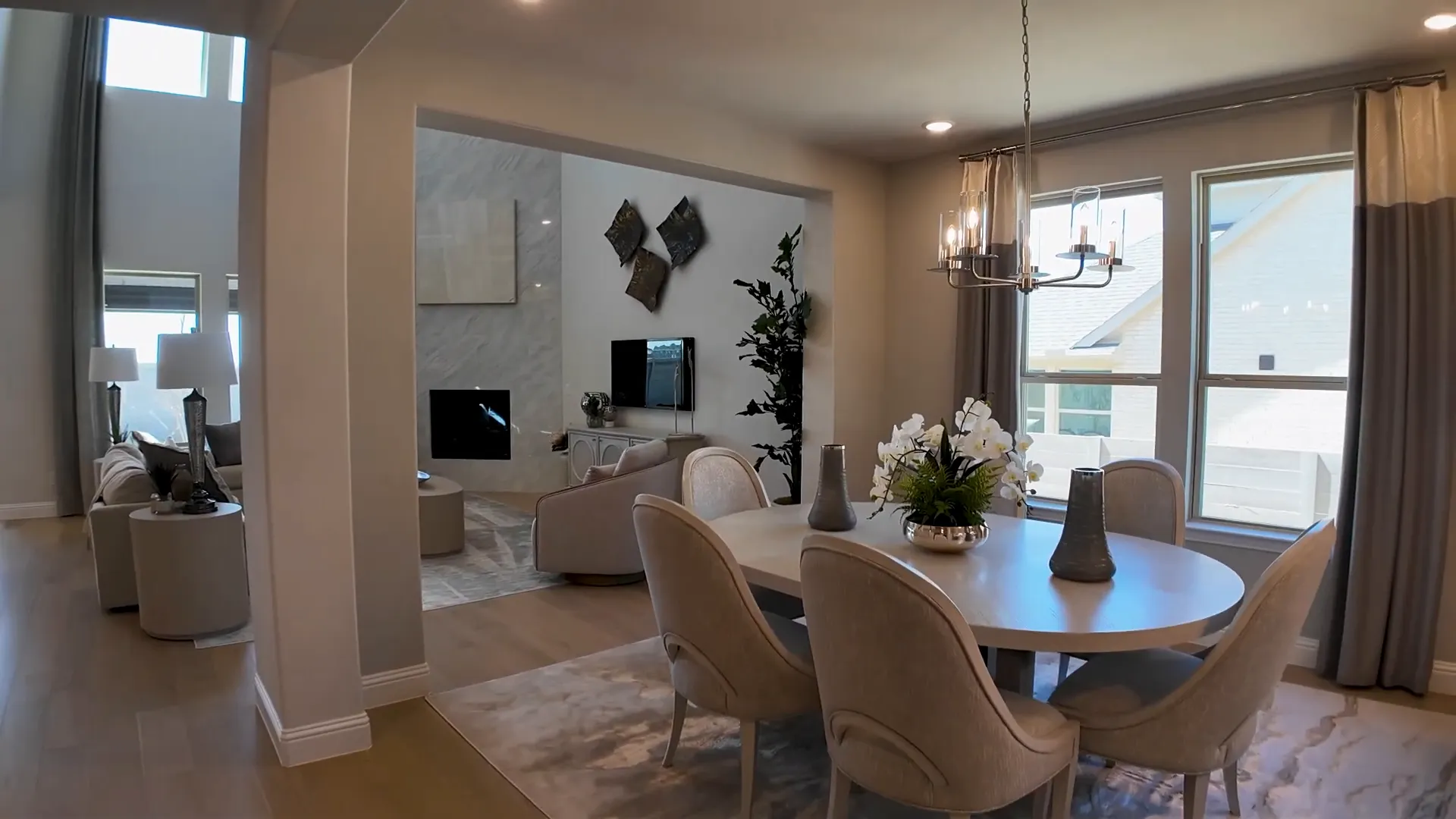Living area with high ceilings and fireplace