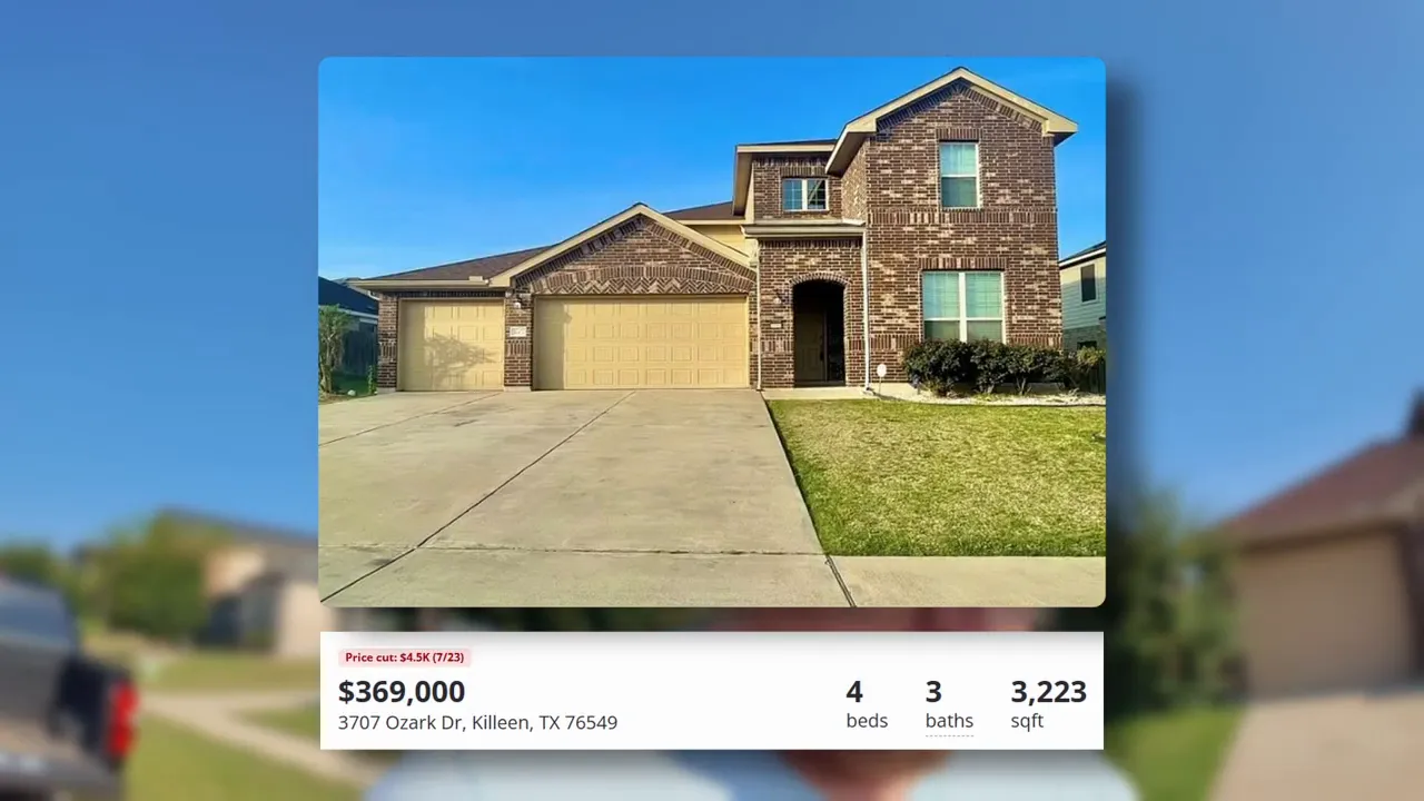 Foyer and hallway of the Ozark Drive home with large chandelier