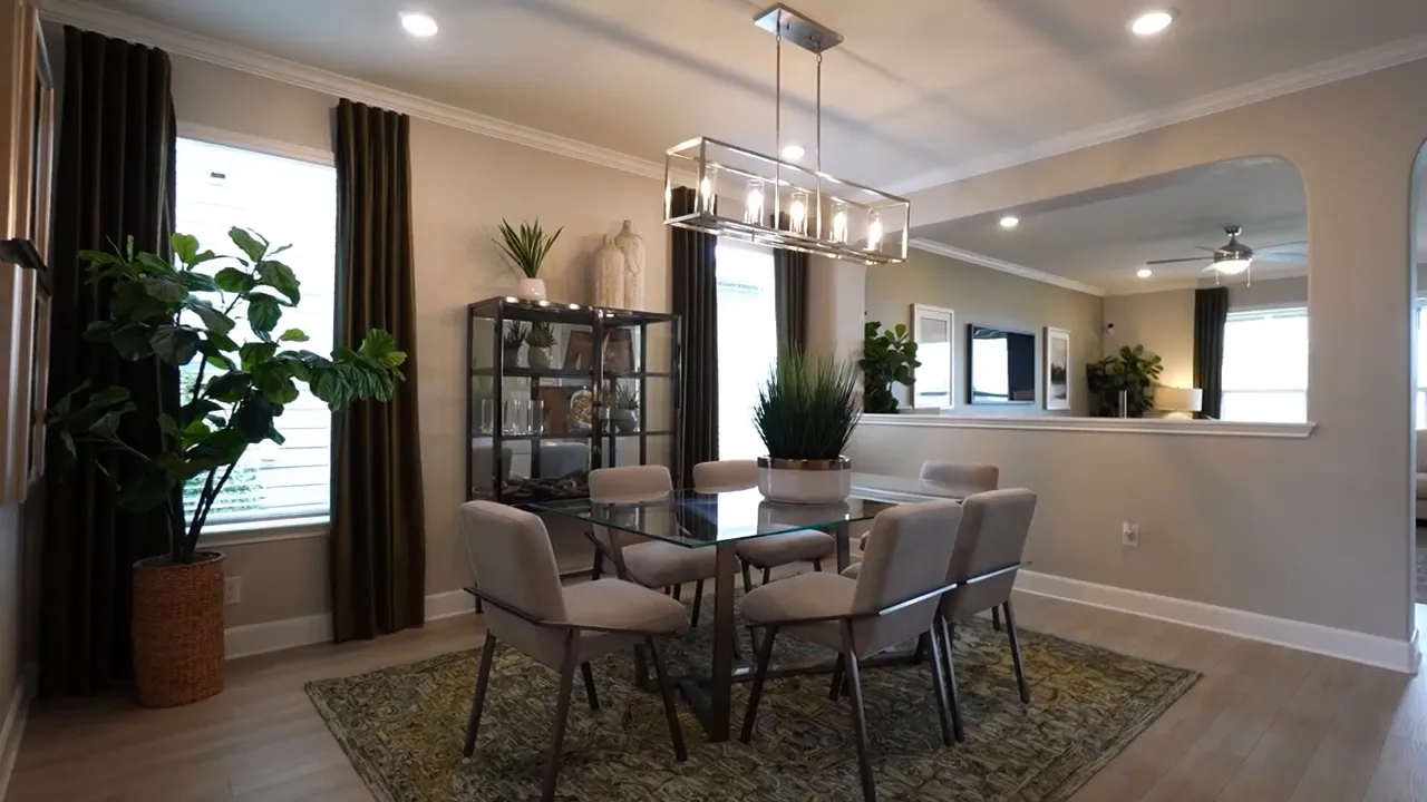New construction style kitchen interior with granite counters and dark cabinetry in Austin area home