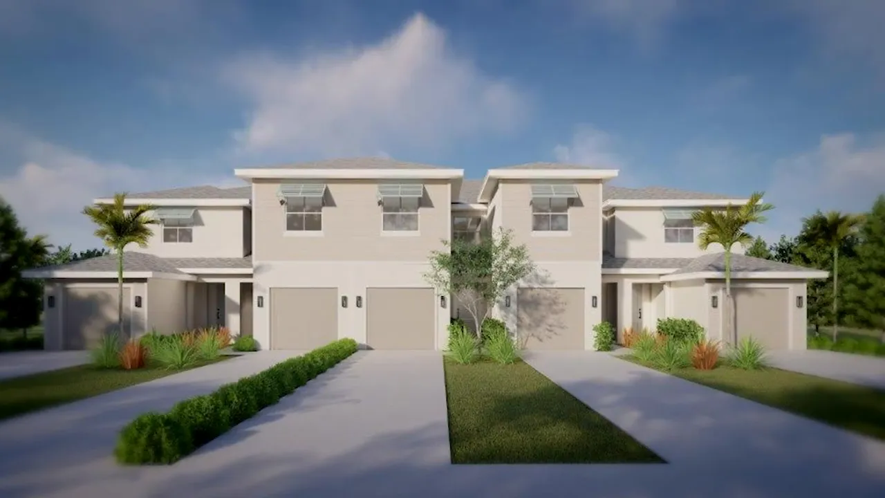 Modern new construction detached home exterior with garage and landscaped front yard in West Palm Beach