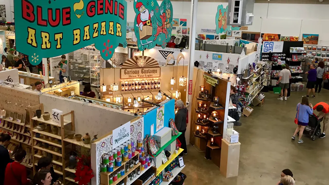 Peppermint Parkway drive-through light tunnel at Circuit of the Americas with illuminated arches and a car on the road