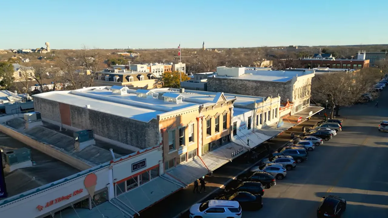 Aerial view of golf-course style open space and homes in Georgetown Texas area