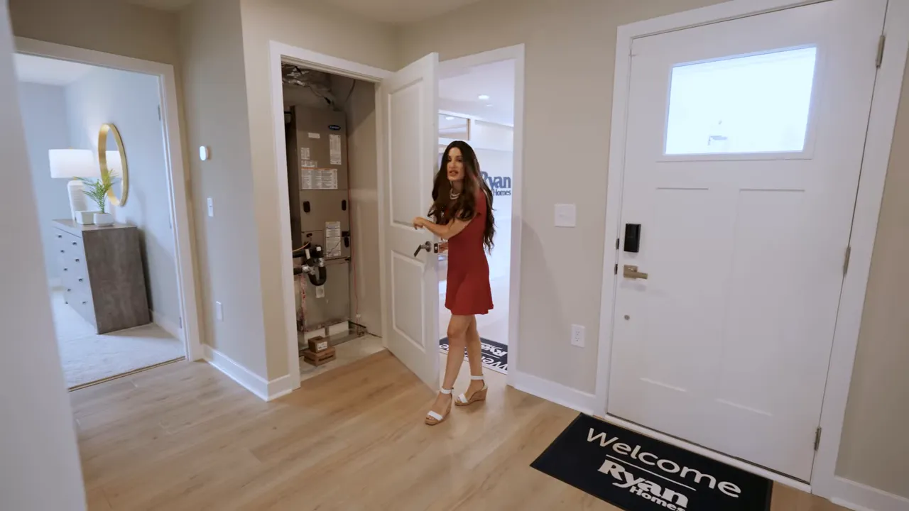 Wide interior foyer with bedroom doors closet doors and hallway leading toward open living area