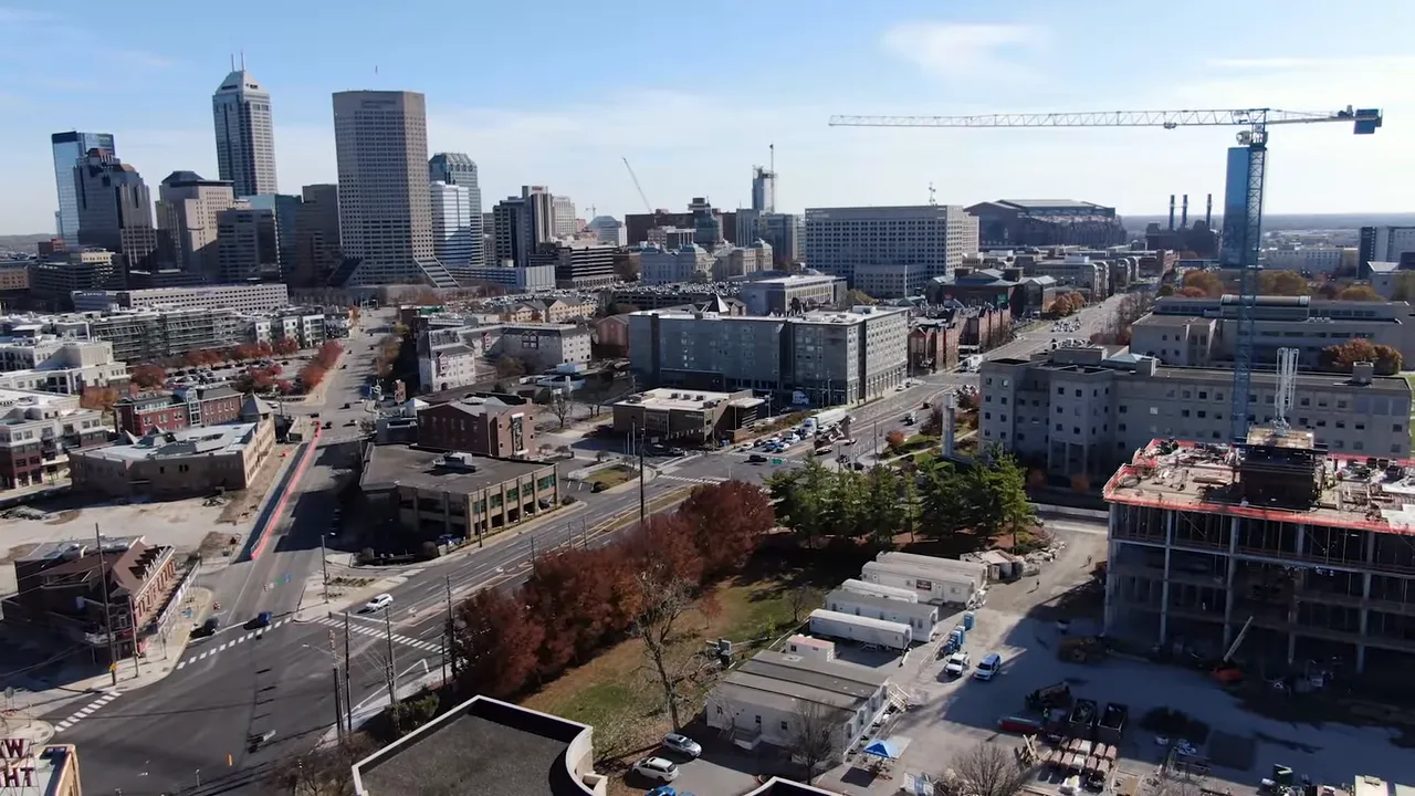 Canal with modern apartment buildings and walkway in Indianapolis
