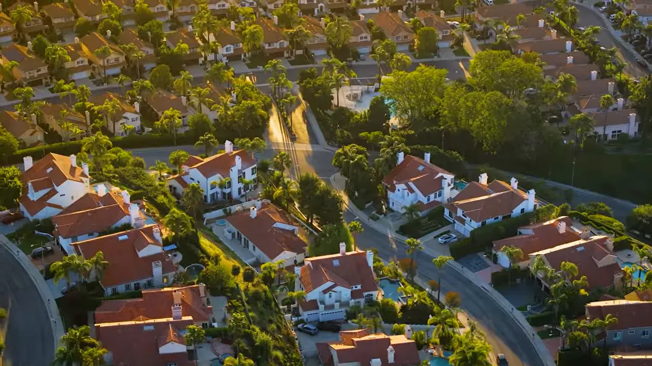 Aerial view of South Redondo Beach with text saying research the exact block