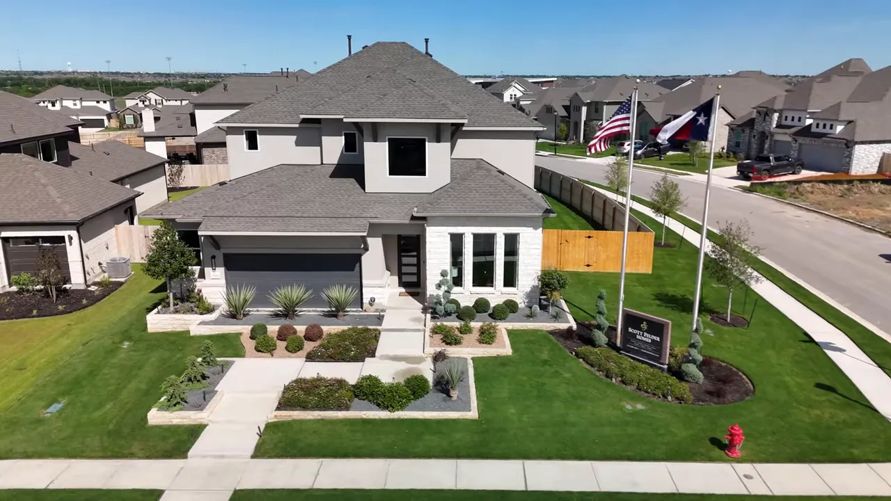 Scott Felder premium model exterior with on-screen specs showing 3,713 square feet and 5 bedrooms at The Grove at Blackhawk
