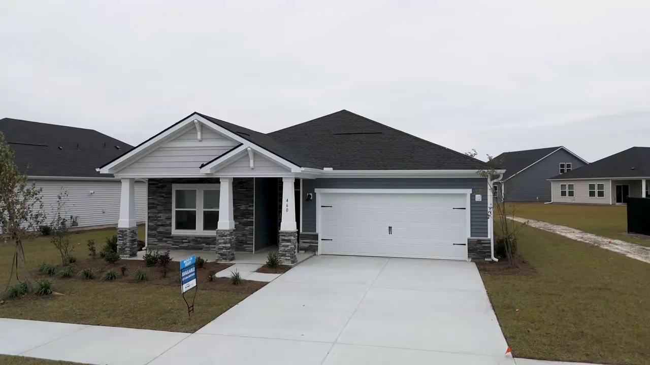 Porch and front elevation of the three-bedroom home with brick accent