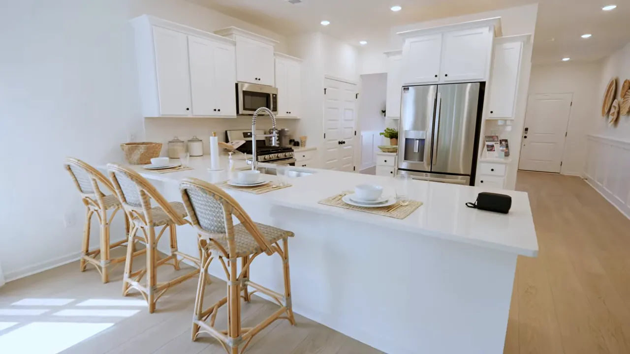 Bright open kitchen with island in a five-bedroom new home in North Myrtle Beach