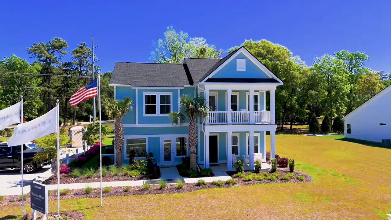 Covered front porch and entry of a new home in North Myrtle Beach with white columns and coastal styling