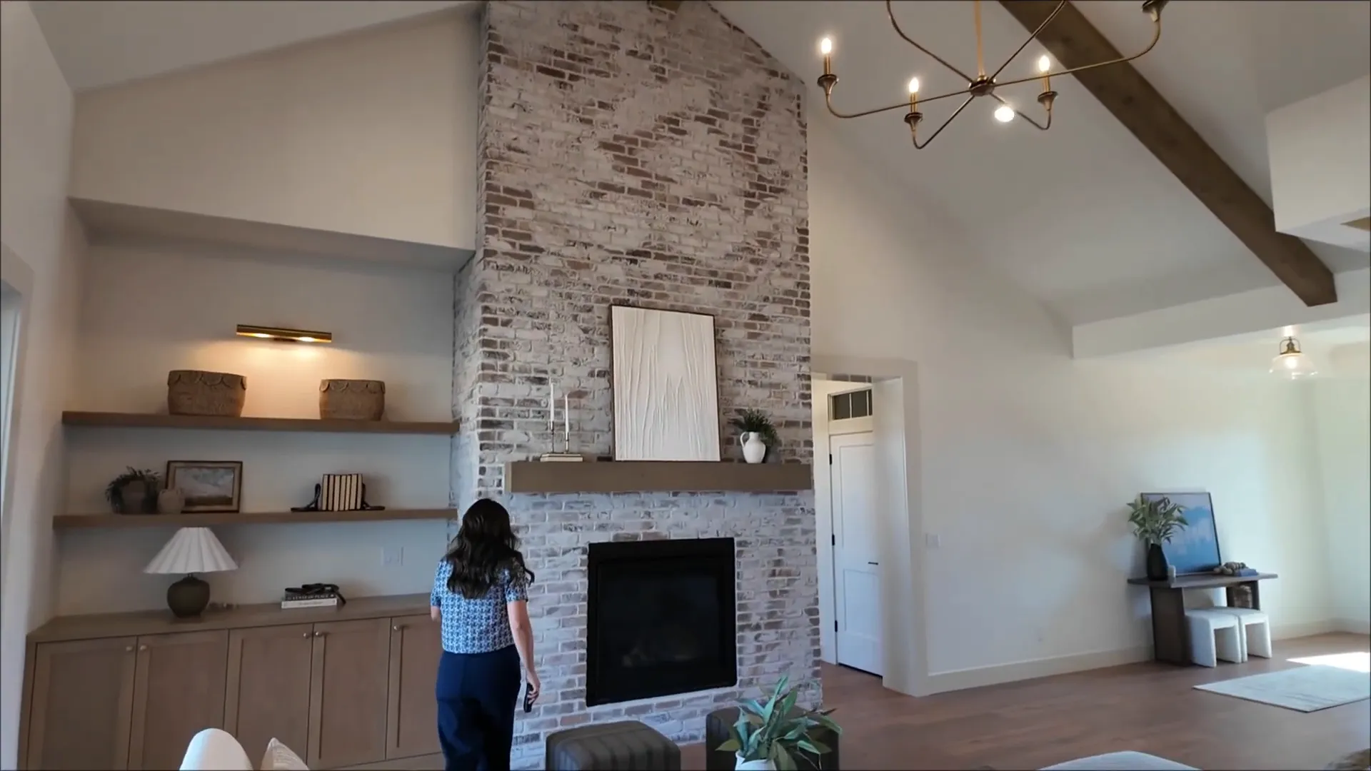 Kitchen view with Thermador hood and tile backsplash