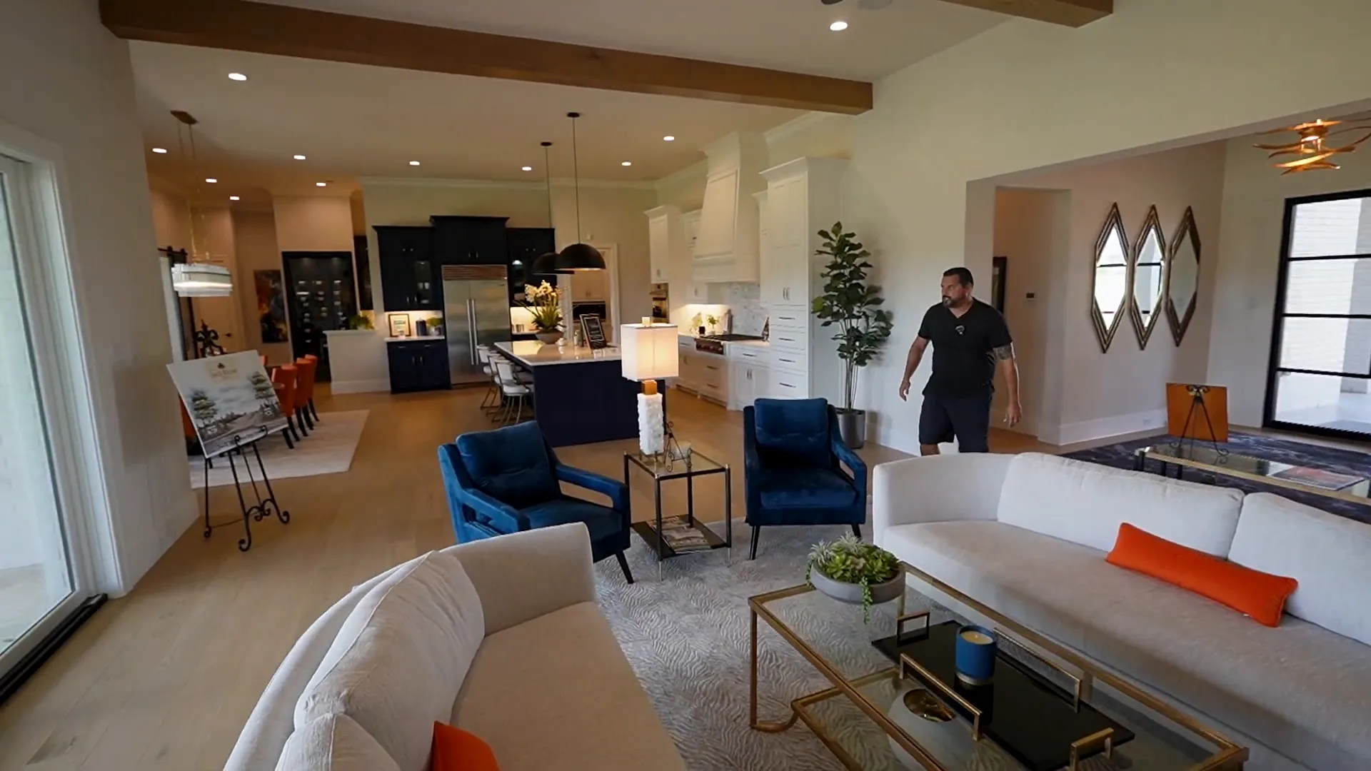 Open family room with built-ins and linear LED fireplace