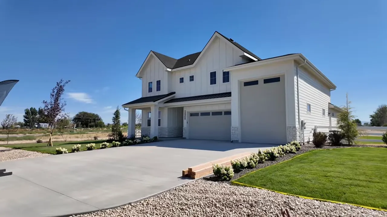 Close-up of the white picket fence and acre-plus lot