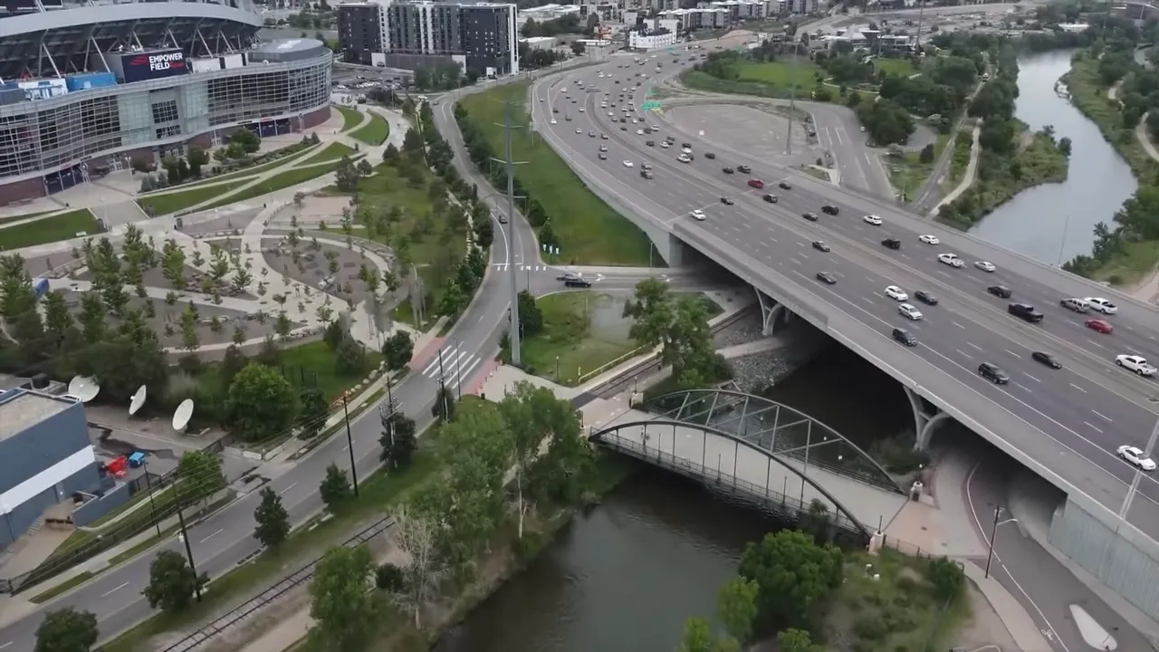 Aerial view of traffic on Denver roads and bridges near the South Platte River