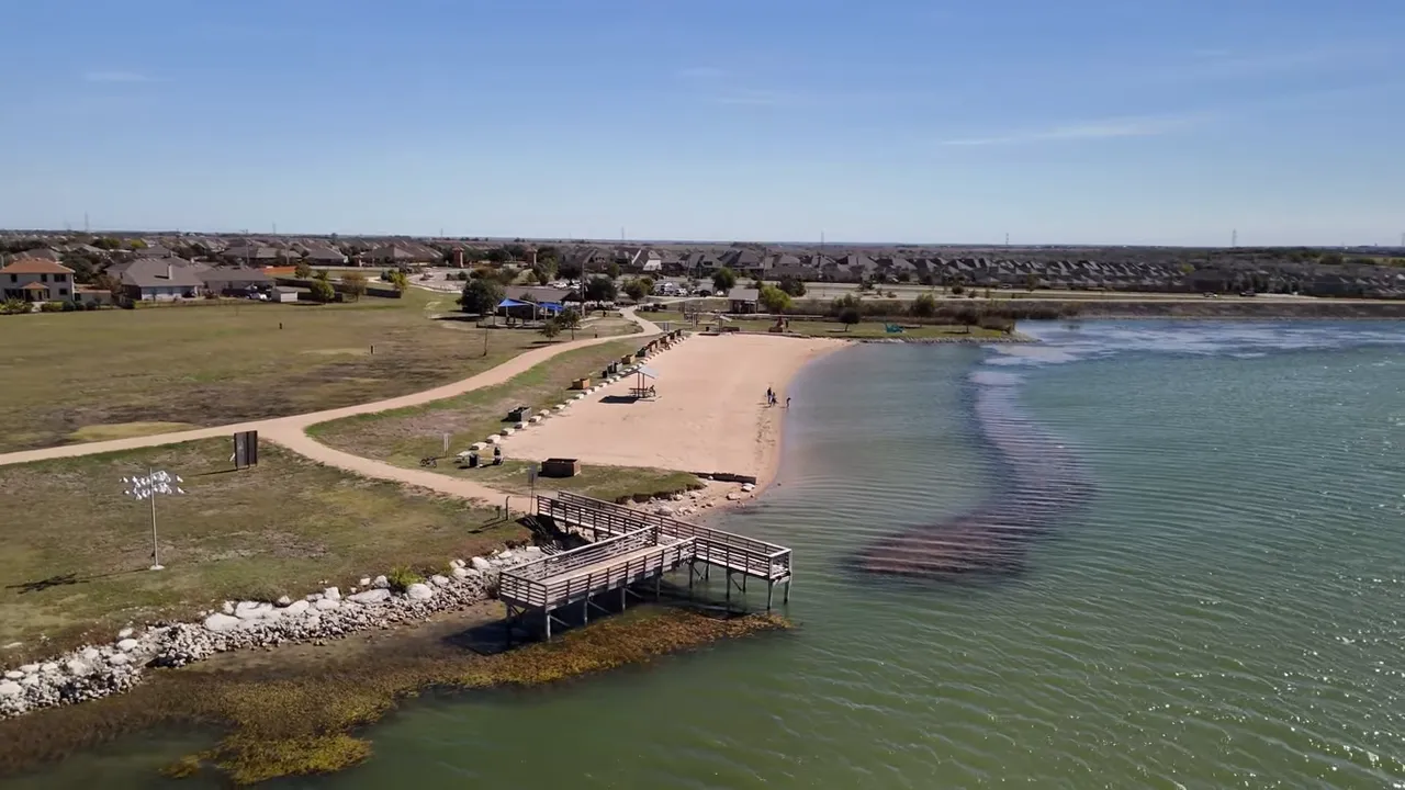 Dark-themed map of northeast Austin showing labeled suburbs Georgetown, Round Rock, Pflugerville, Hutto and Manor plus a legend for affordable vs popular new-construction areas.