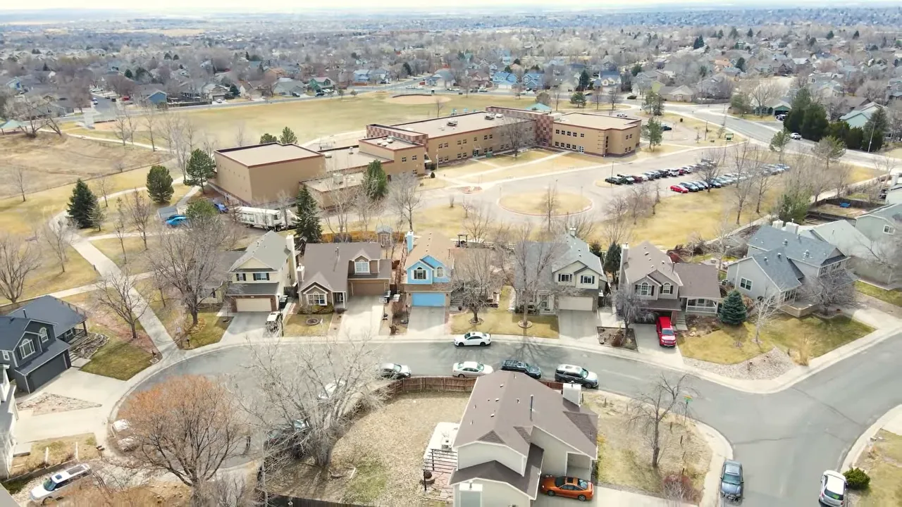 Real estate agent explaining the tradeoffs of living farther east in the Denver metro