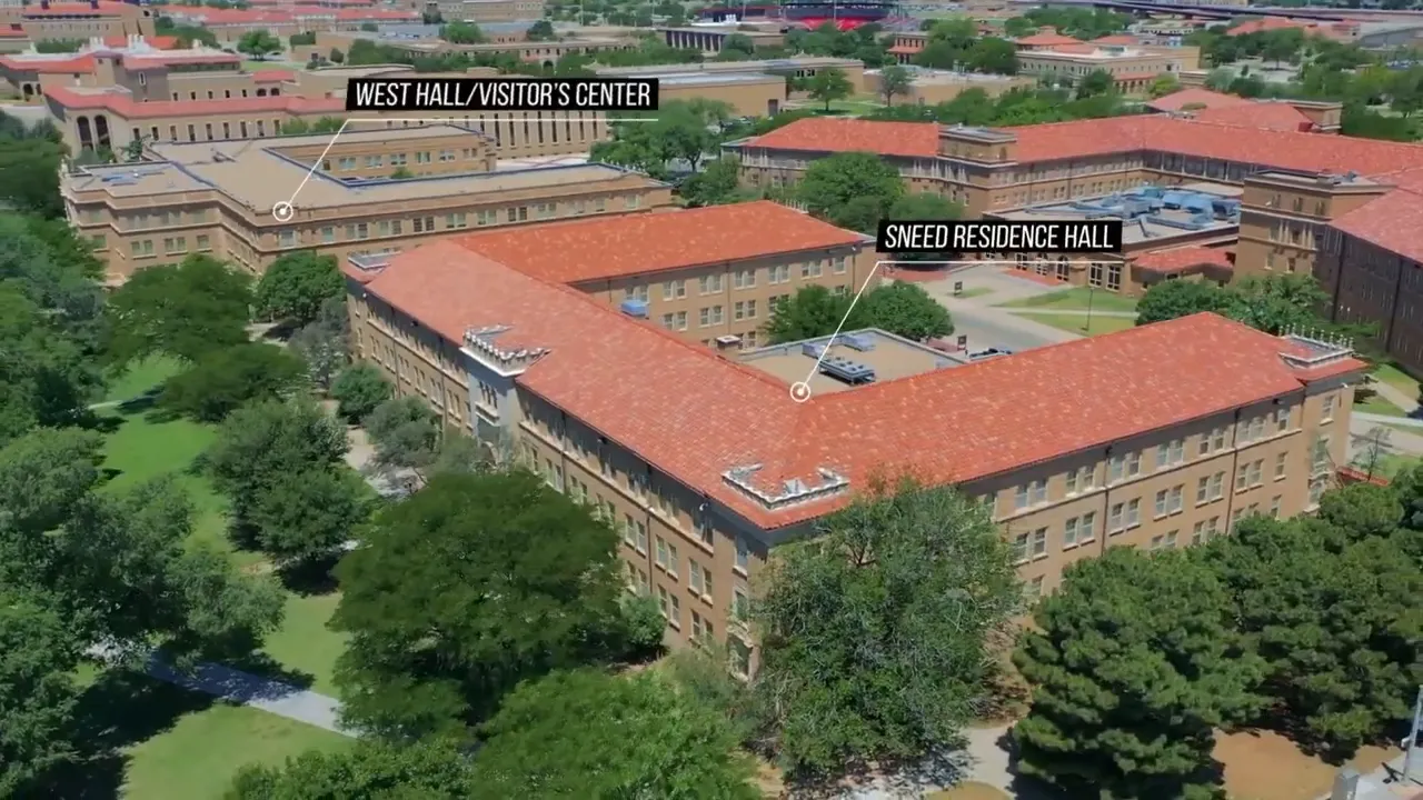 Presenter speaking in front of a leafy backdrop with an illuminated 'ON AIR' sign; a large 'CALL 806-464-9380' banner runs across the bottom.