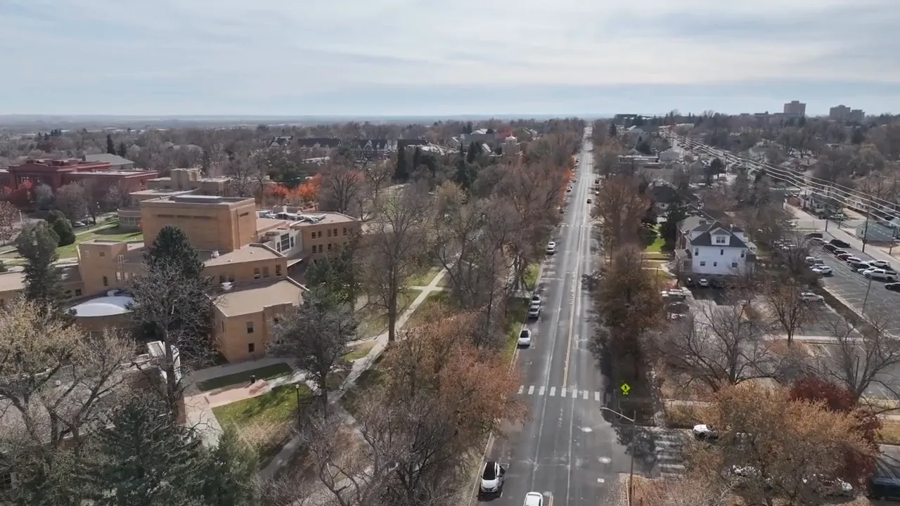 row of newer suburban homes with driveways and front lawns