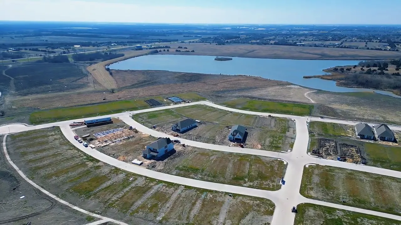 Wide exterior view of the lot boundary and surrounding area in a DFW new home community