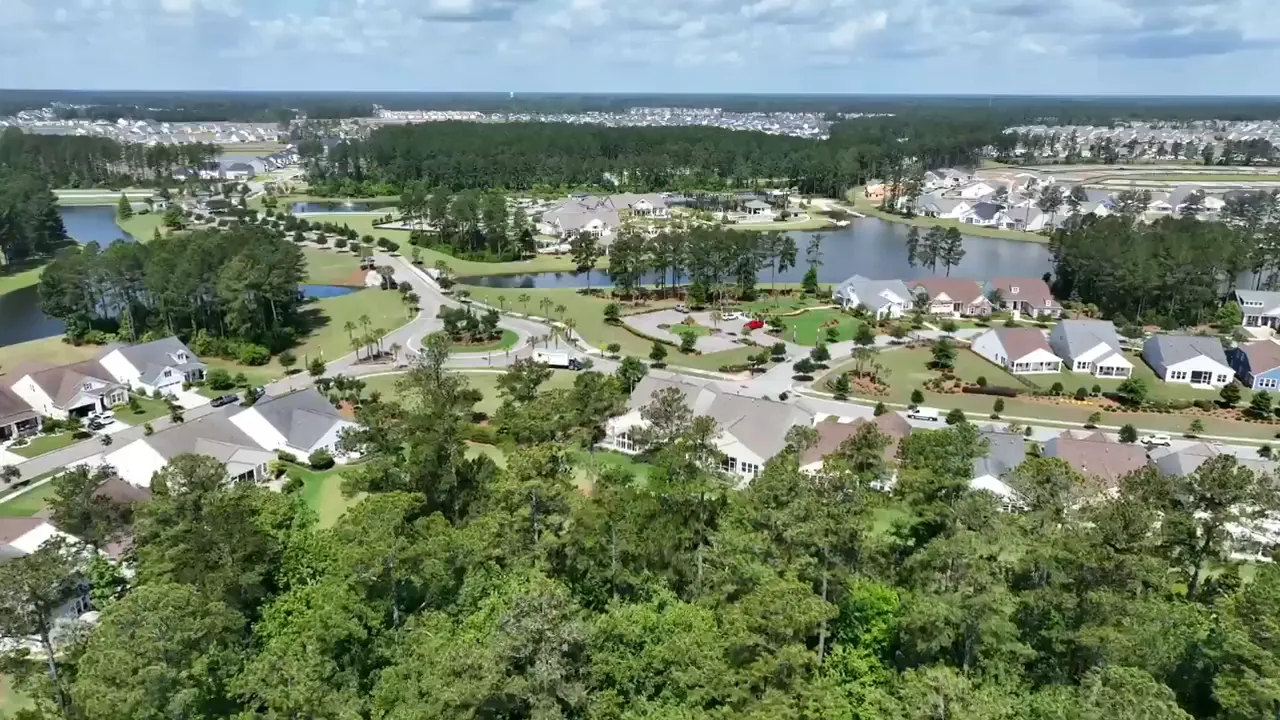 Single-story home exterior in Four Seasons 55+ community in Cane Bay Plantation, Summerville SC