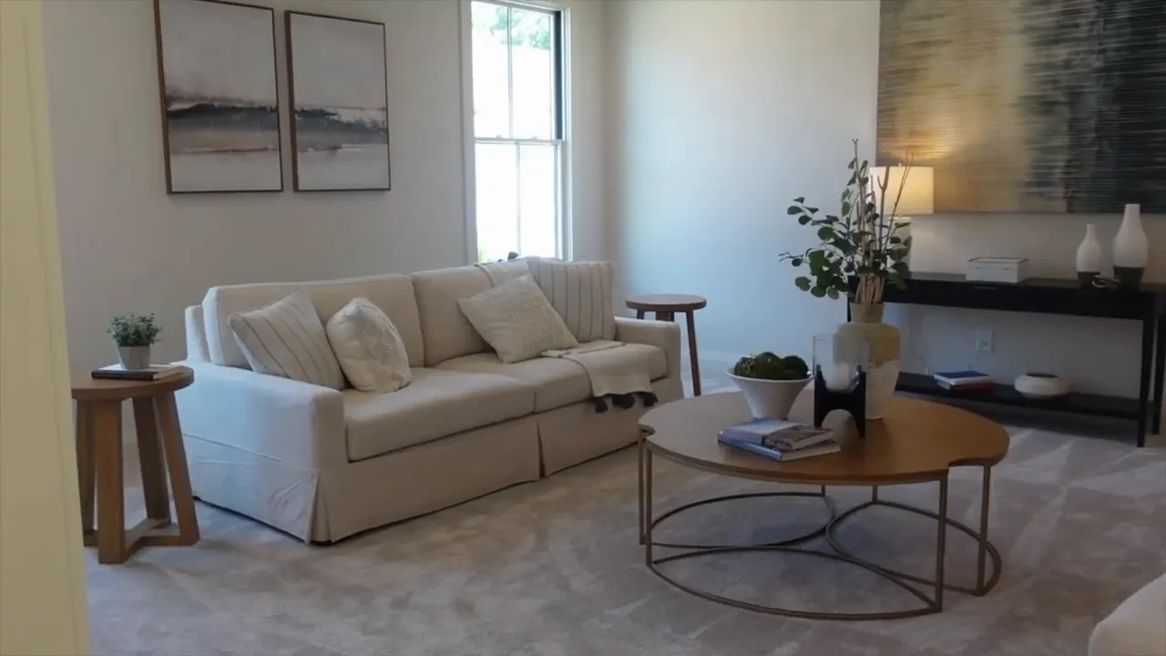 Large upstairs loft with sofa fireplace coffee table and windows