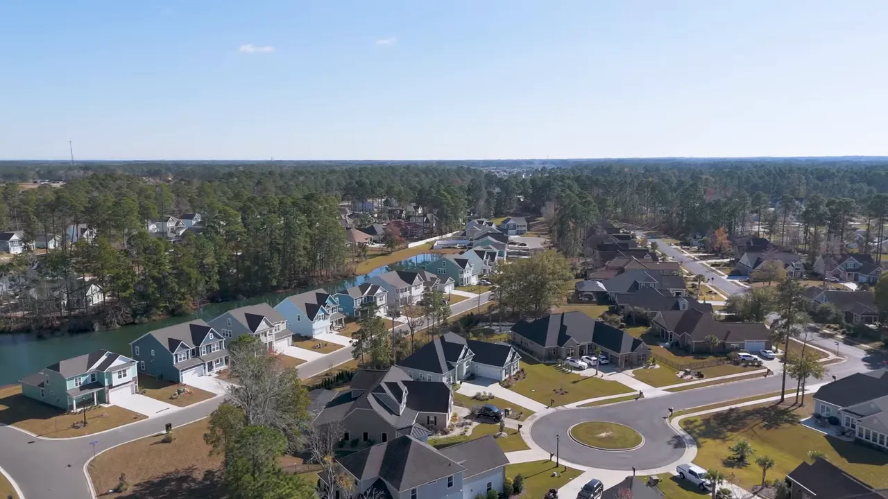 Satellite aerial map of Carolina Forest with a Traditions marker, Carolina Bays Parkway and the Intracoastal Waterway visible; small presenter inset