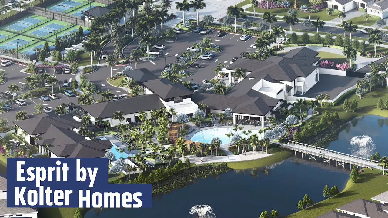 Aerial view of Esprit by Kolter Homes with pool and water feature in Avenir Palm Beach Gardens