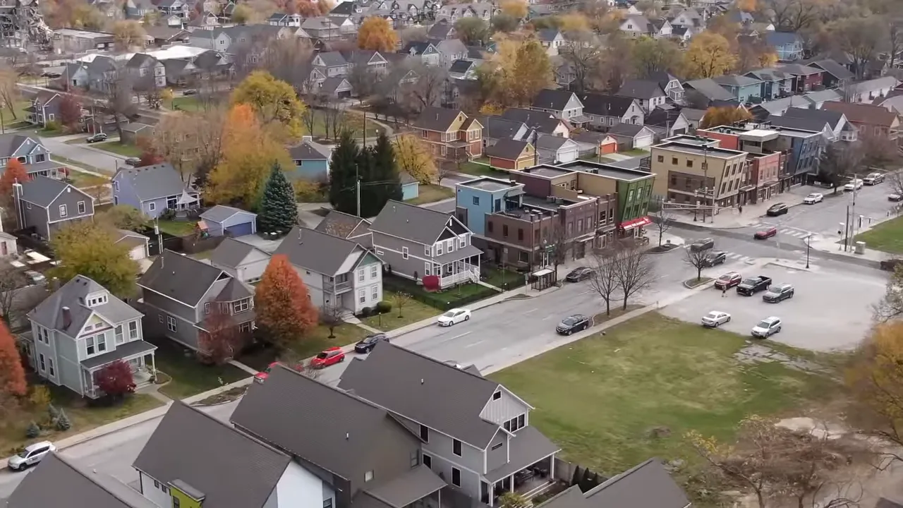 Historic home's porch and stone foundation with arched supports, showing architectural details
