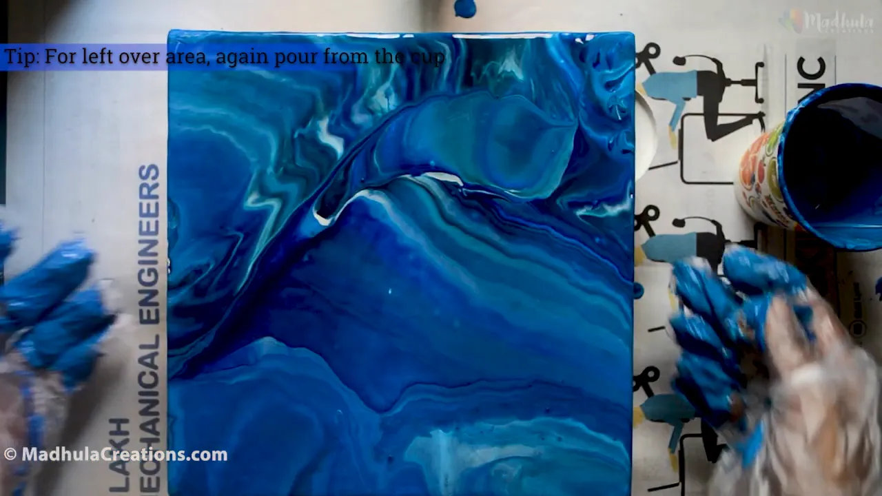 Applying finishing touches to the painting