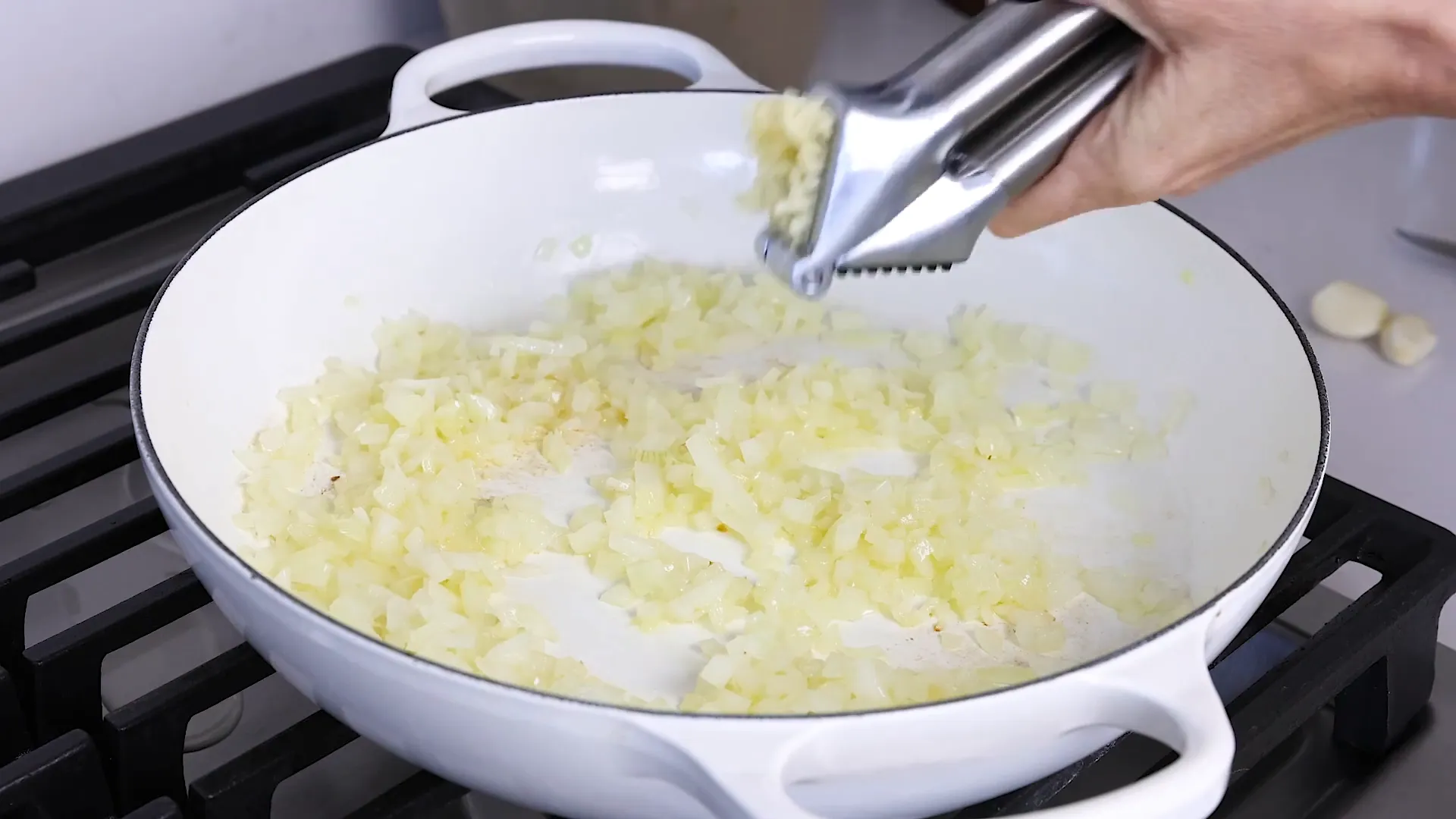 Adding garlic to sauté