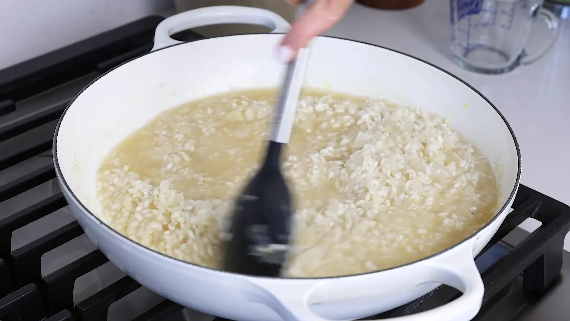 Stirring broth into rice