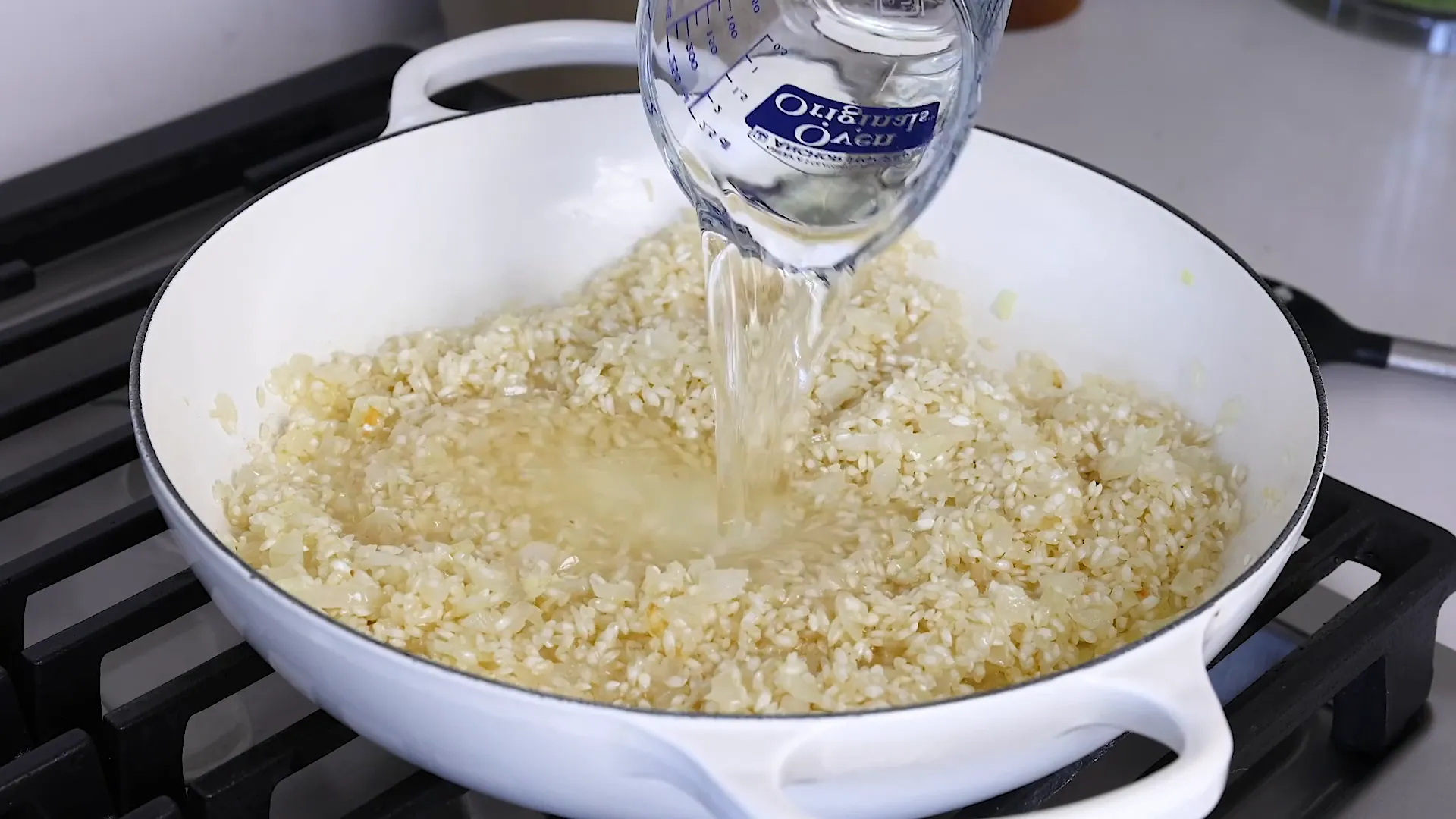 Adding white wine to pan