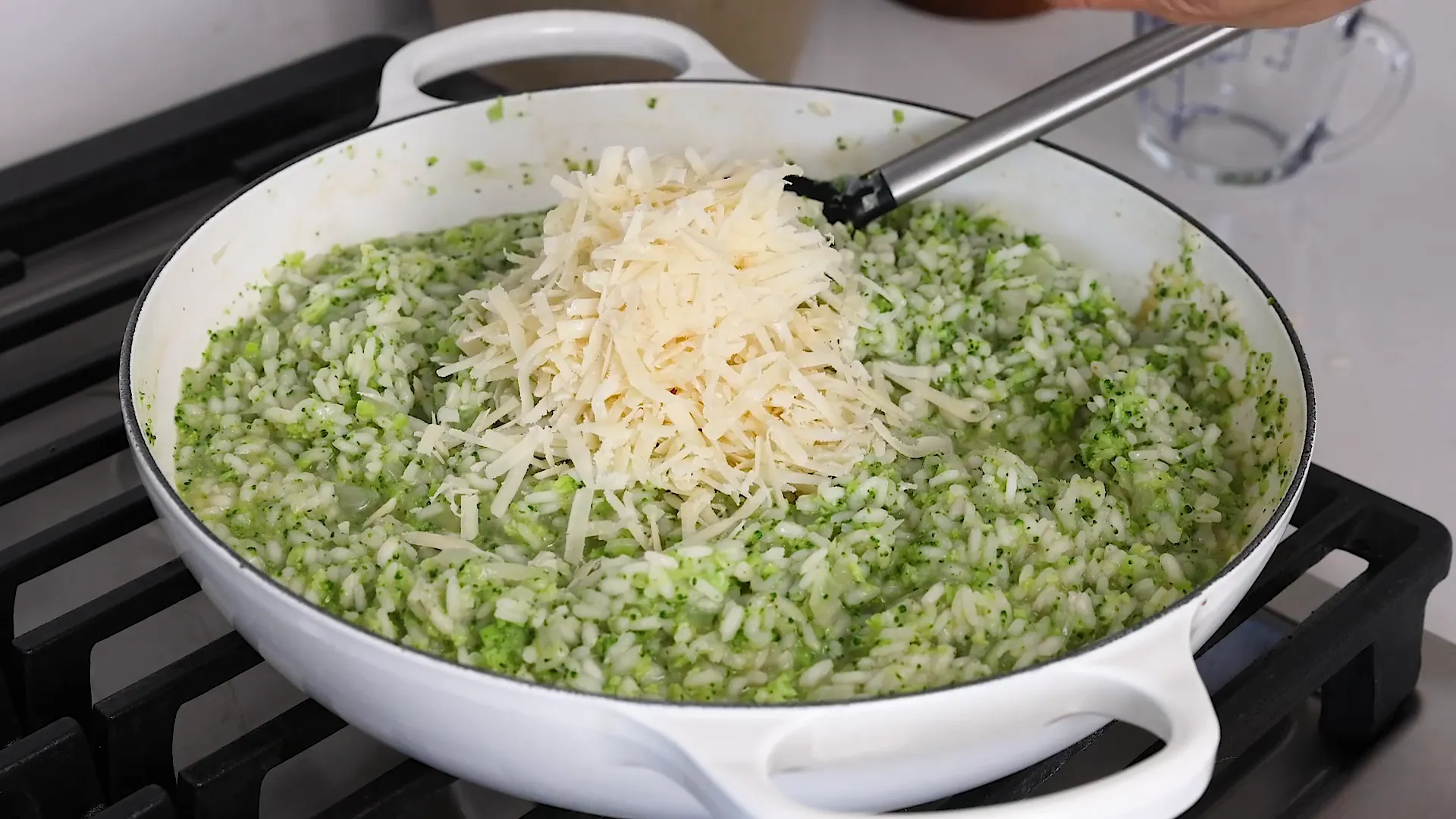 Adding parmesan cheese to risotto