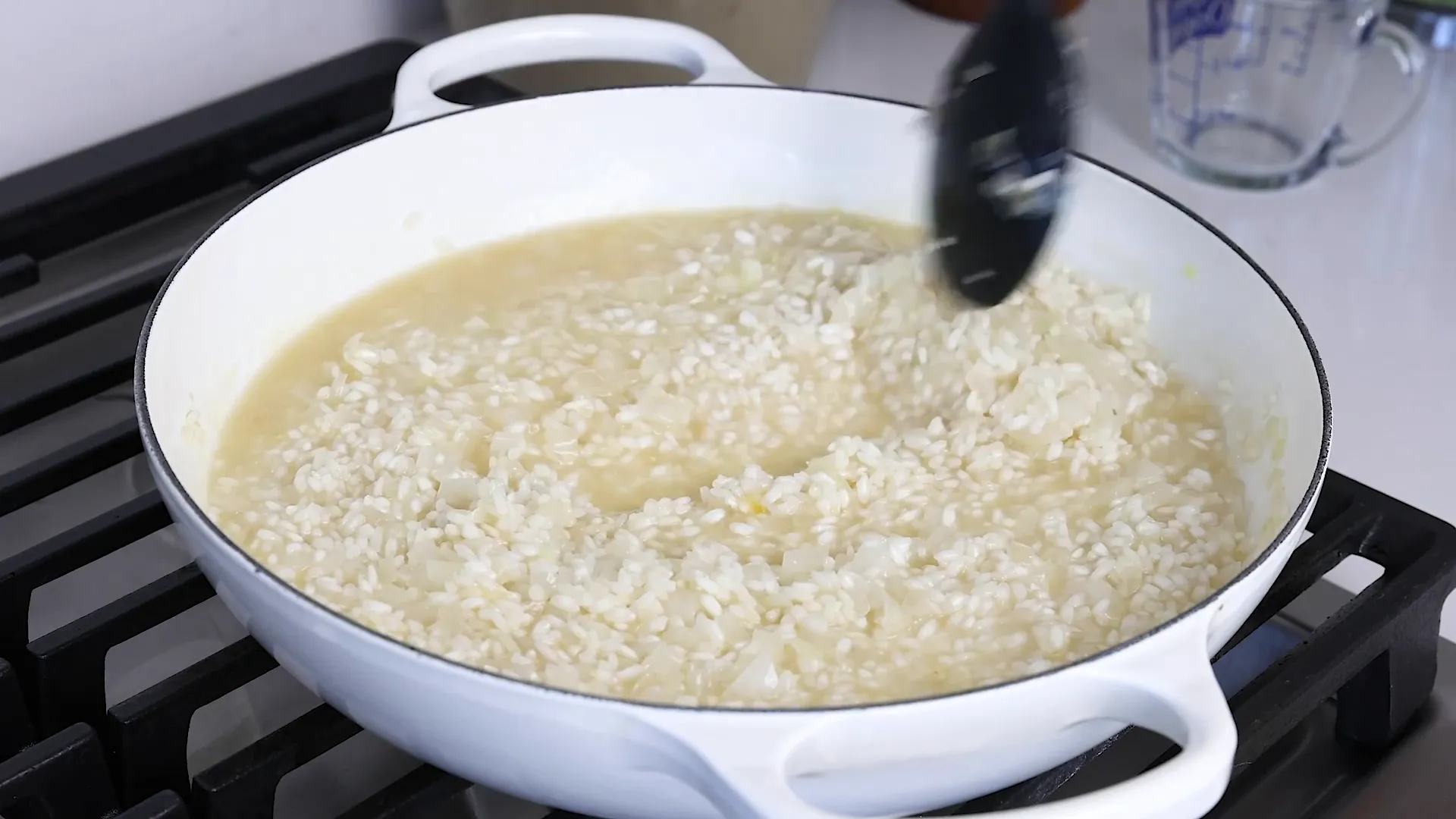 Risotto cooking with broth
