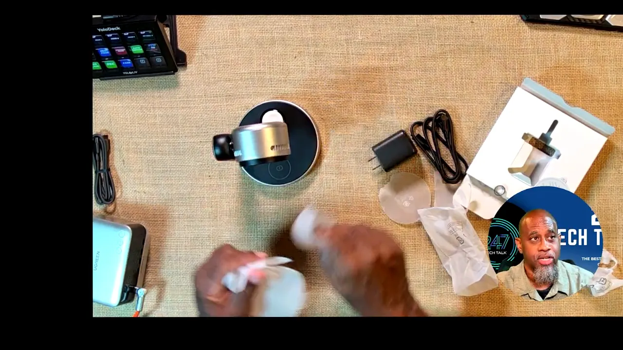 UGREEN charging stand, USB-C cable, power adapter, and packaging arranged on a desk