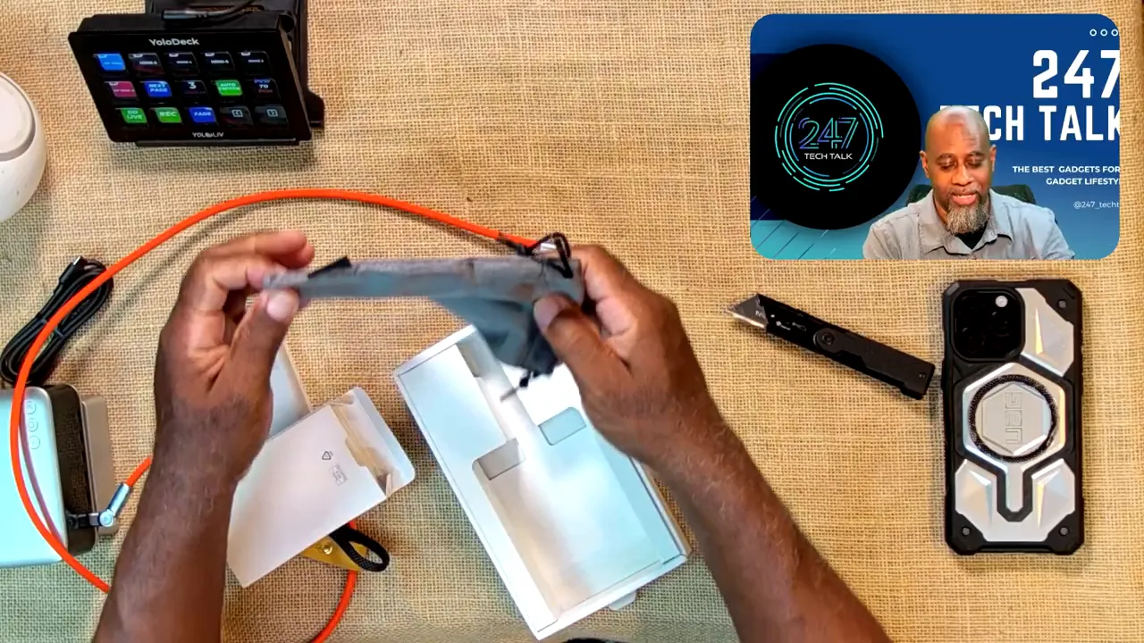 Soft gray storage pouch above the opened MagFlow Pro package and accessories