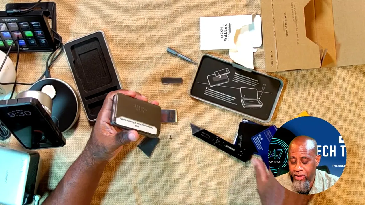 Metal wallet held open with folded paper currency inside the magnetic rear compartment