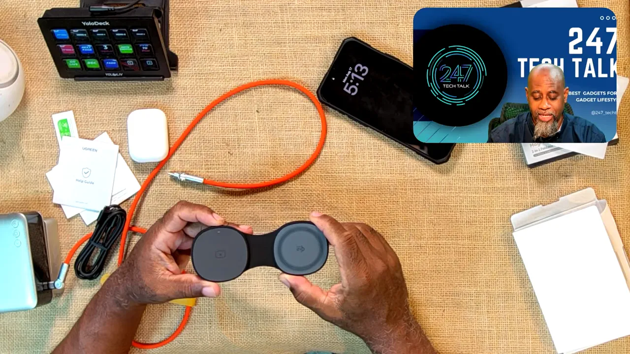 Foldable black charger opened to show two circular wireless charging surfaces