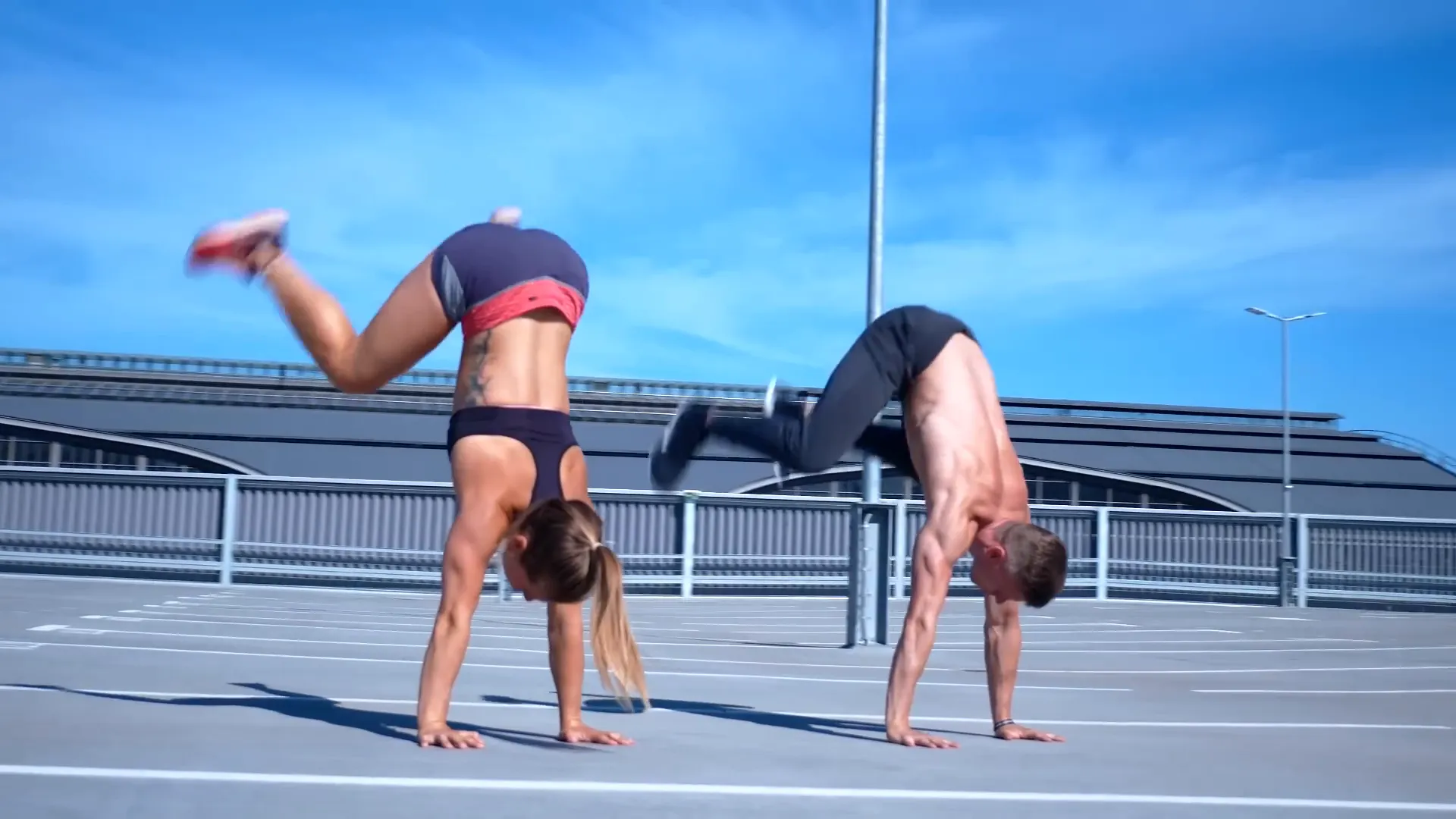 Demonstration of squat to handstand