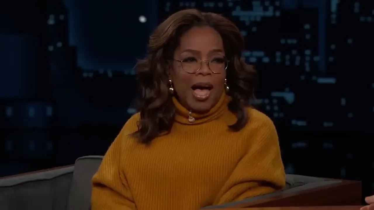 Oprah Winfrey laughing during the interview