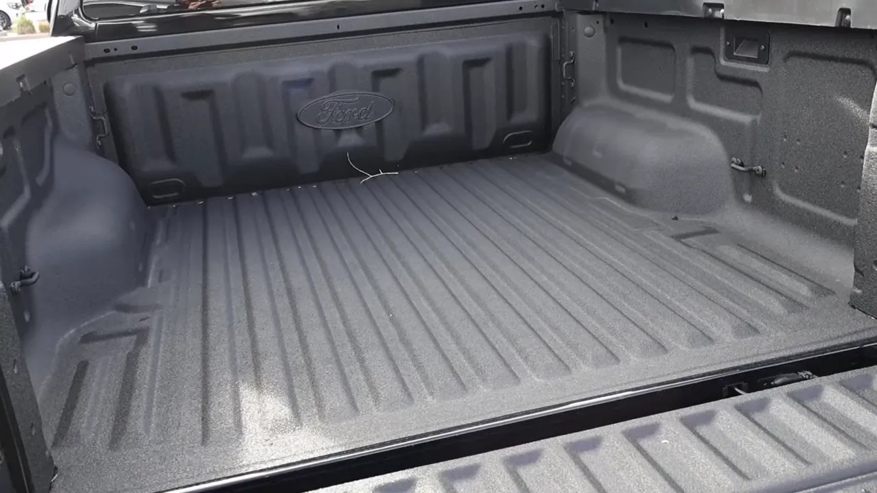 Ford Ranger Raptor bed with factory spray-in liner and open tailgate