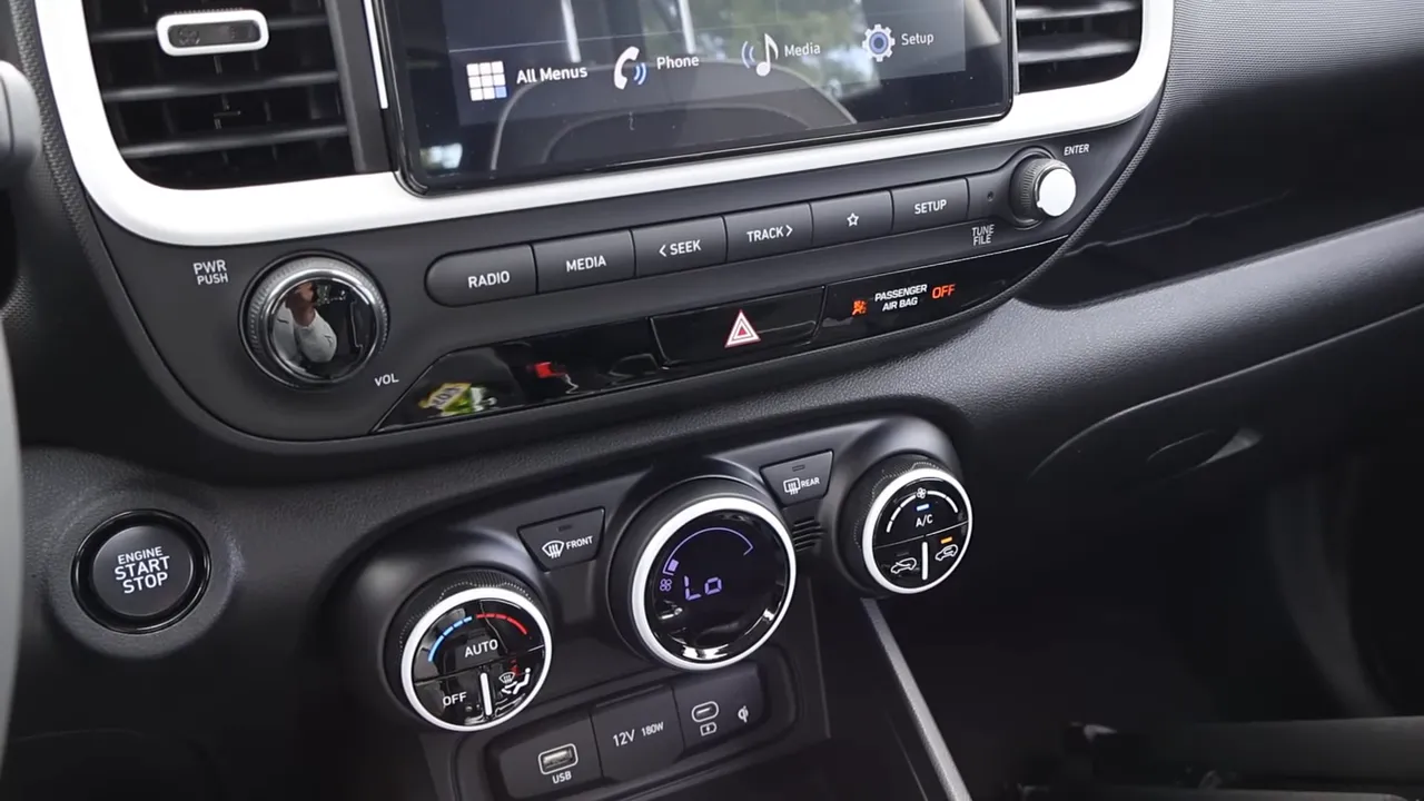 Hyundai Venue center stack with infotainment screen, media buttons and USB and 12V ports